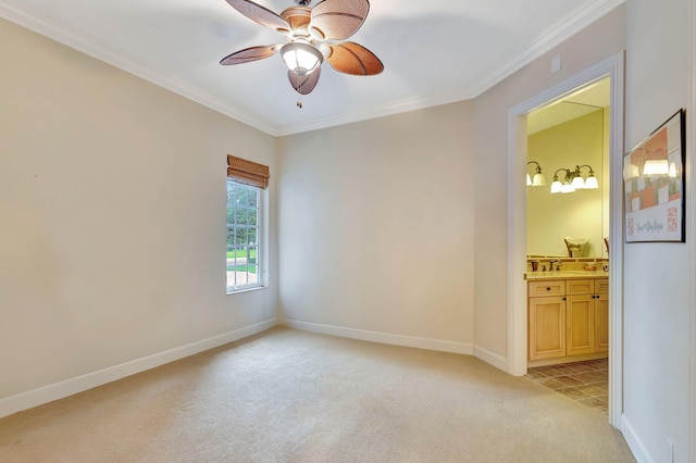 empty room with ceiling fan, light colored carpet, ornamental molding, and sink