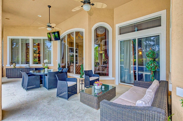 view of patio featuring ceiling fan and an outdoor hangout area