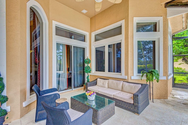 view of patio / terrace featuring an outdoor living space and ceiling fan