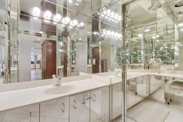 bathroom with tile patterned floors and sink