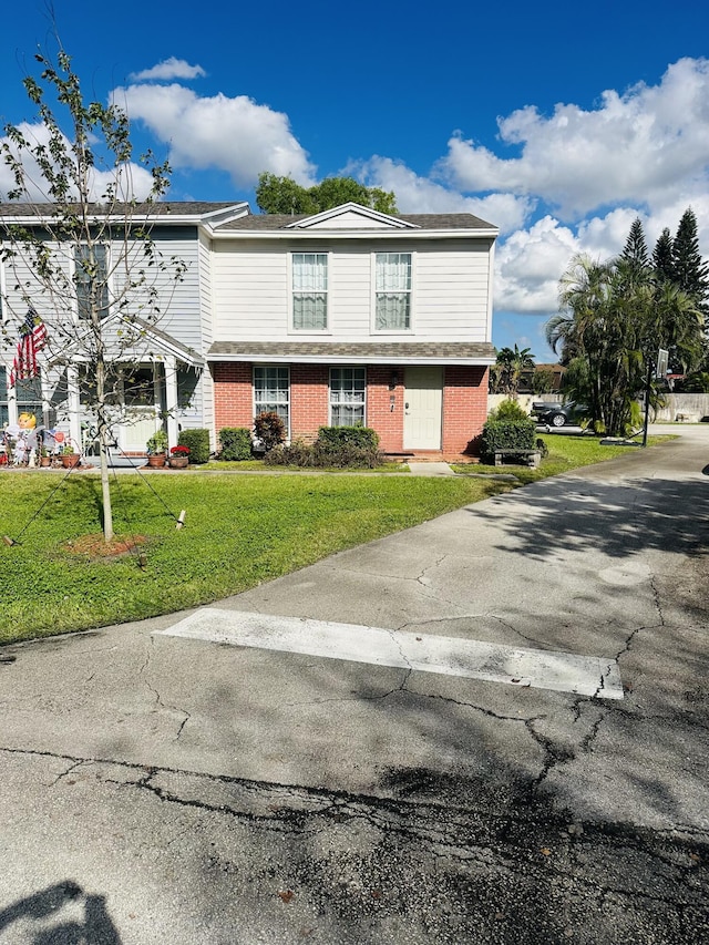 view of front of property with a front yard