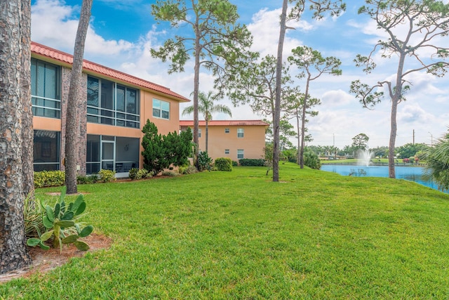 view of yard with a water view