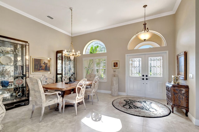 1935 SW Whitemarsh Way, Palm City, FL 34990 - foyer with crown molding, a chandelier, baseboards, french doors, and light tile patterned floors