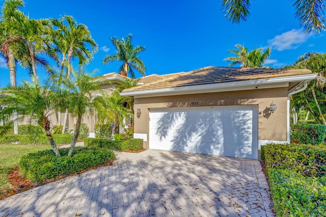 view of front of property featuring a garage