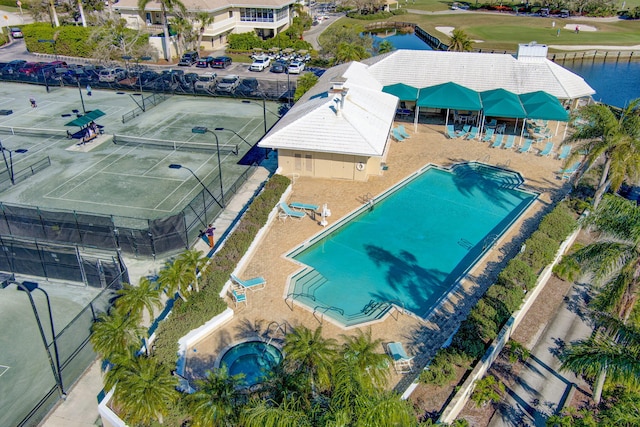 1935 SW Whitemarsh Way, Palm City, FL 34990 - drone / aerial view of a pool, a large body of water, and a golf club