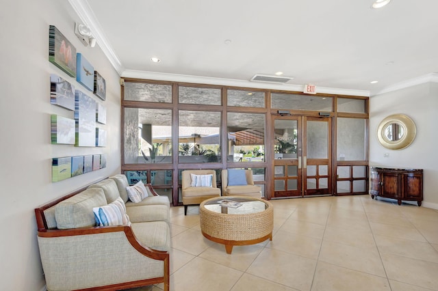 living room featuring ornamental molding, floor to ceiling windows, and light tile patterned floors