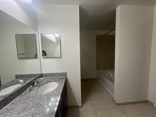 bathroom featuring tile patterned floors and vanity