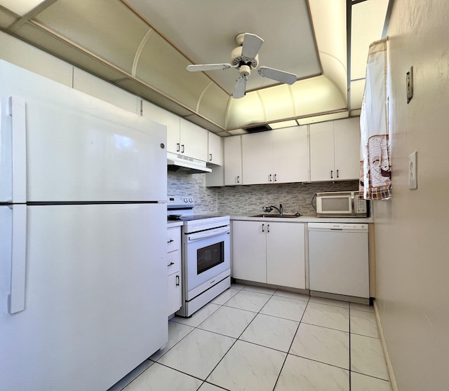 kitchen with white cabinetry, sink, ceiling fan, white appliances, and decorative backsplash