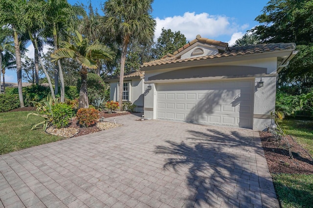 view of property exterior featuring a yard and a garage