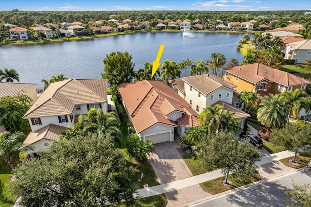 drone / aerial view with a water view