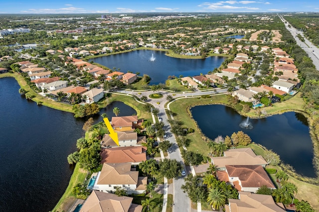 aerial view featuring a water view