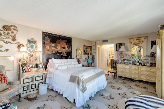 bedroom featuring a textured ceiling