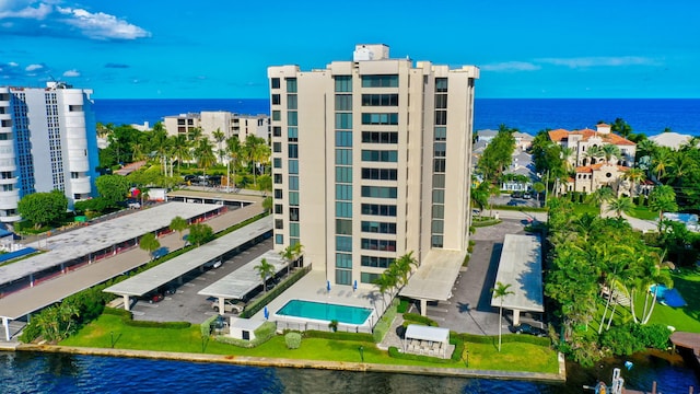 view of building exterior with a water view