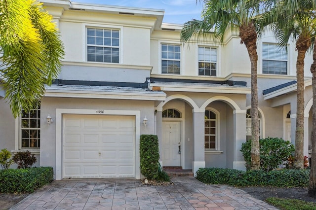 view of front of property with a garage