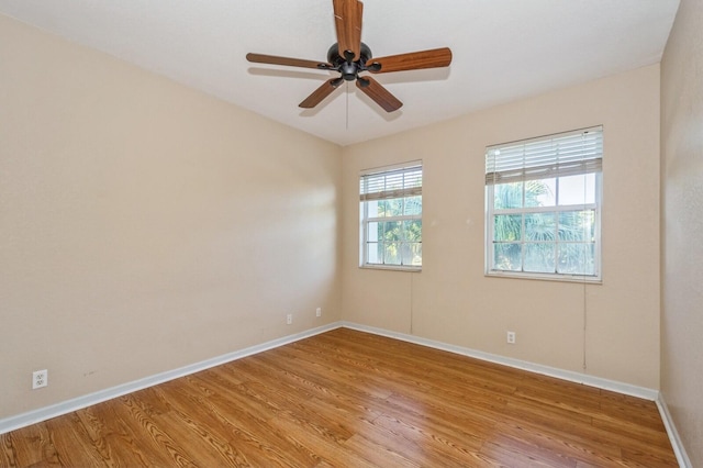 unfurnished room with ceiling fan and light hardwood / wood-style floors