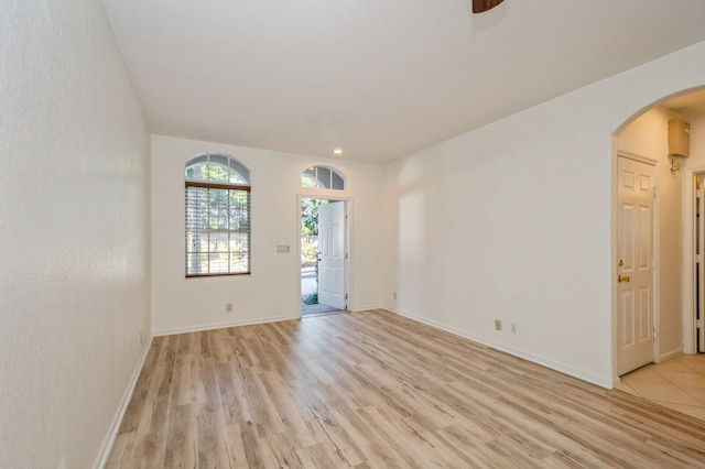 unfurnished room featuring light hardwood / wood-style flooring