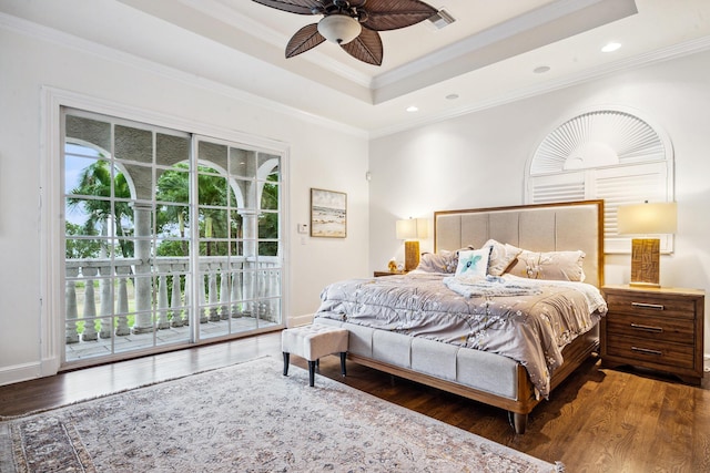 bedroom with dark hardwood / wood-style floors, ceiling fan, access to exterior, and multiple windows