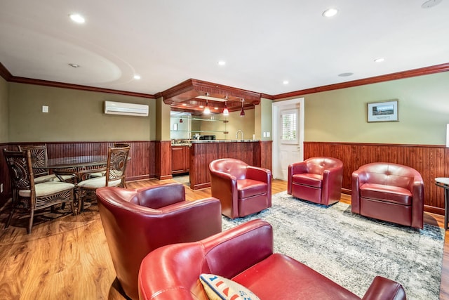 living room with indoor bar, light hardwood / wood-style floors, a wall mounted air conditioner, and ornamental molding