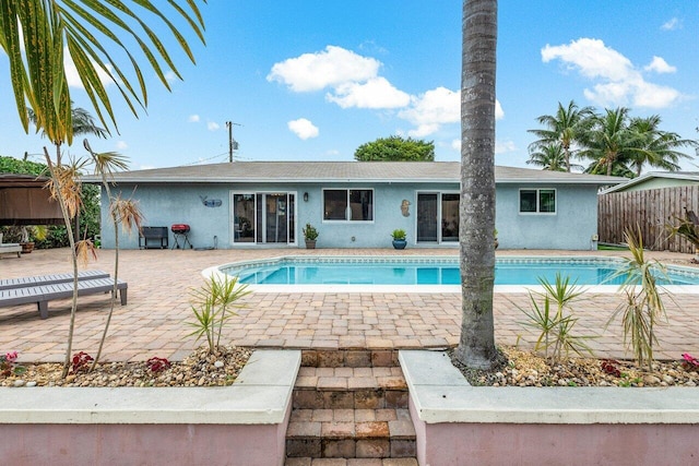 view of swimming pool featuring a patio