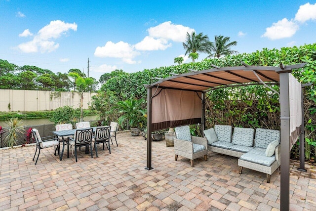 view of patio with a pergola and an outdoor hangout area