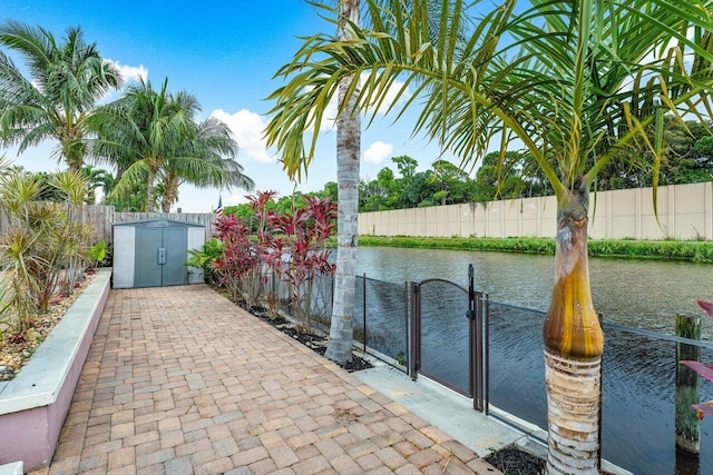 view of patio with a water view