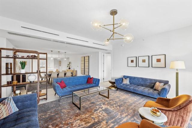 living room with a notable chandelier