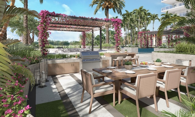 view of patio / terrace with an outdoor kitchen, grilling area, and a pergola