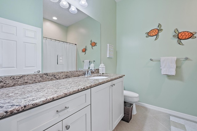 bathroom with toilet, a shower with curtain, vanity, and tile patterned floors