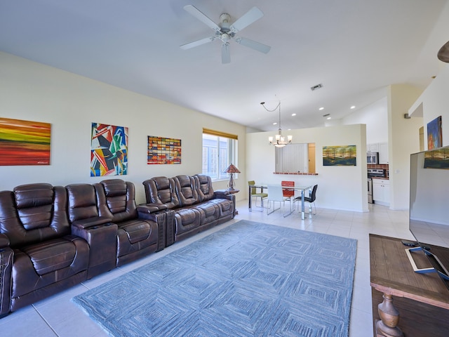 living room with ceiling fan with notable chandelier and light tile patterned flooring