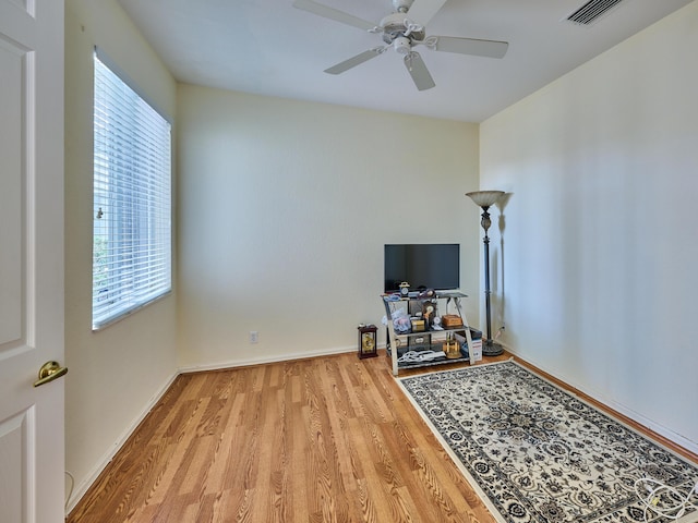 miscellaneous room featuring light hardwood / wood-style flooring and ceiling fan