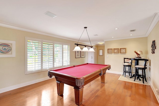 recreation room featuring baseboards, light wood-style floors, ornamental molding, and pool table