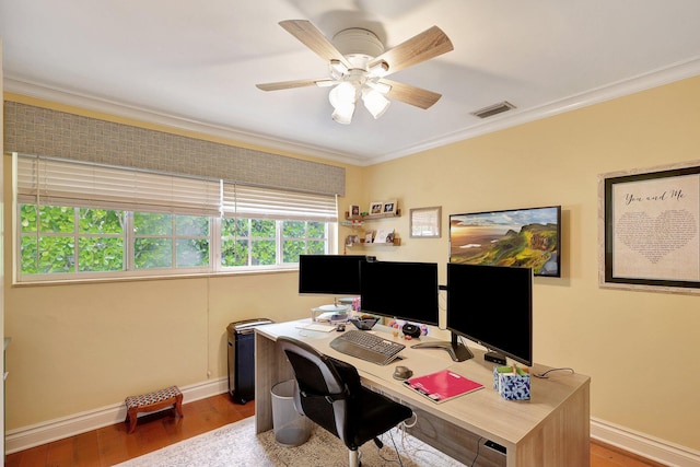 home office with wood finished floors, baseboards, and ornamental molding