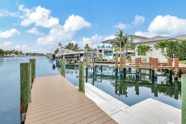 view of dock with a water view and boat lift