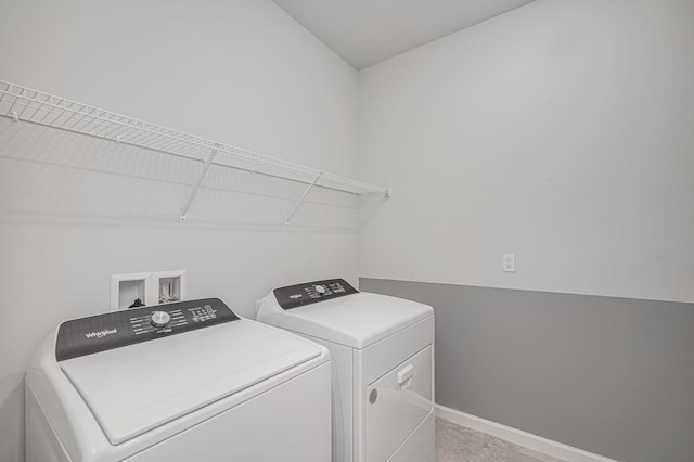 laundry room with separate washer and dryer