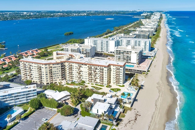 bird's eye view with a beach view and a water view