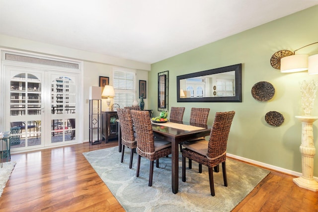 dining room featuring light hardwood / wood-style flooring and sink