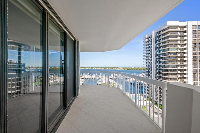 balcony featuring a water view