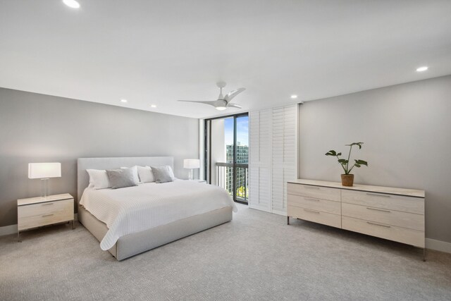 carpeted bedroom with access to outside and ceiling fan