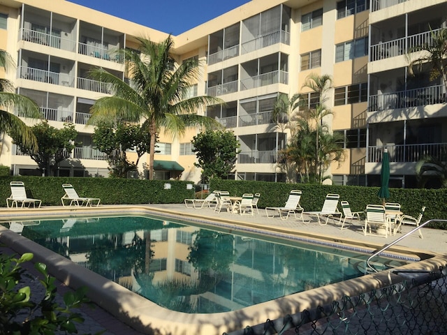 view of swimming pool featuring a patio area