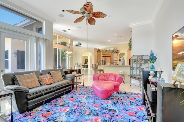 living room with ceiling fan, light tile patterned floors, and ornamental molding