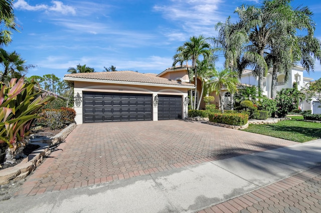 view of front of property with a garage