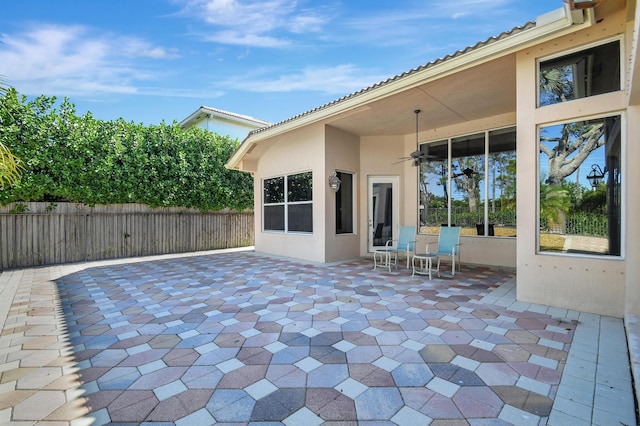 view of patio with ceiling fan