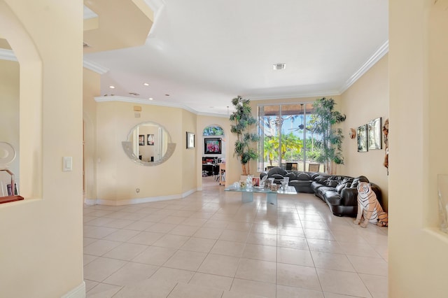 living room featuring light tile patterned floors and crown molding