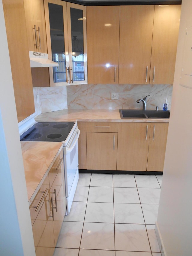 kitchen with backsplash, white electric range oven, sink, light brown cabinets, and light tile patterned floors