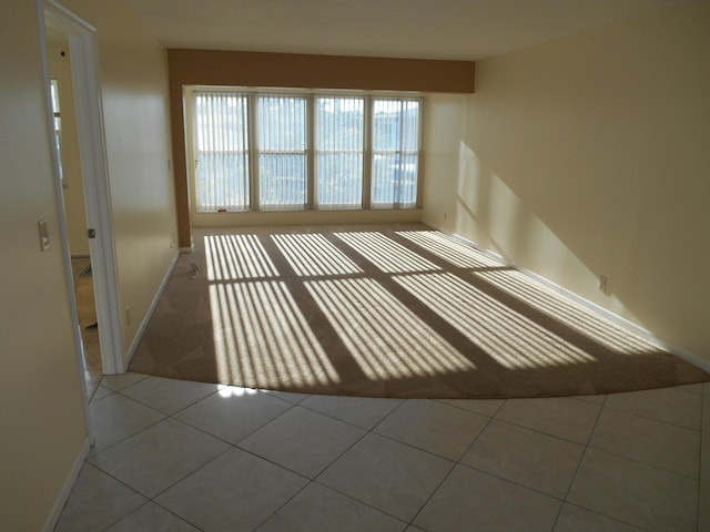 view of tiled spare room