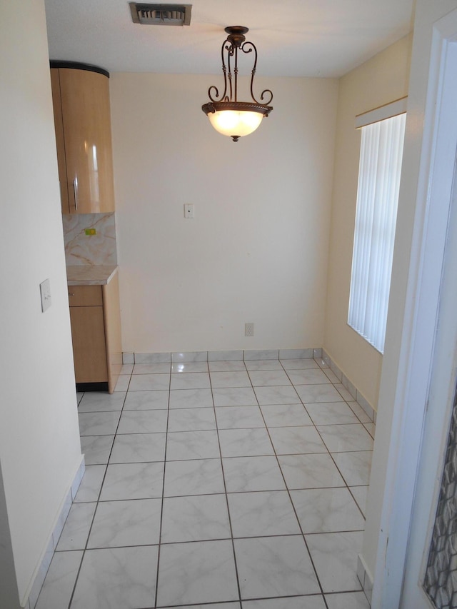 view of unfurnished dining area