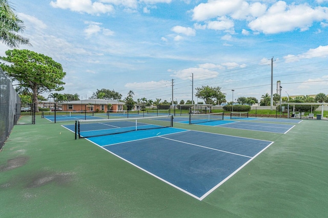 view of sport court with basketball hoop