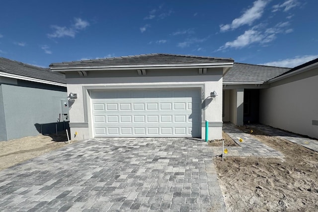 exterior space with decorative driveway