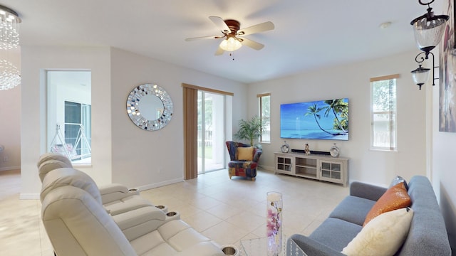 tiled living room with ceiling fan