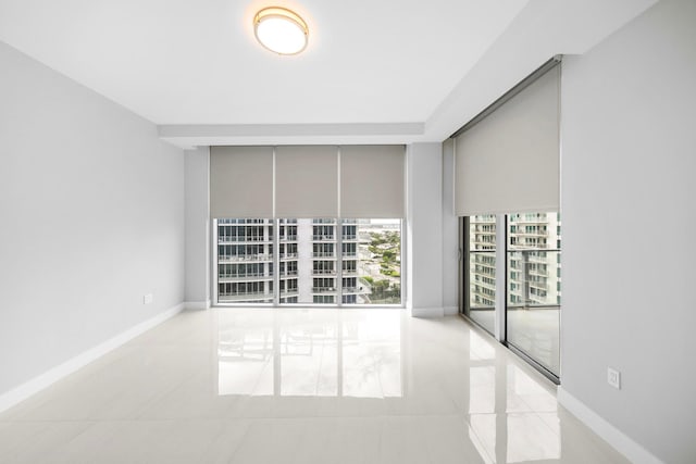 empty room featuring light tile patterned flooring